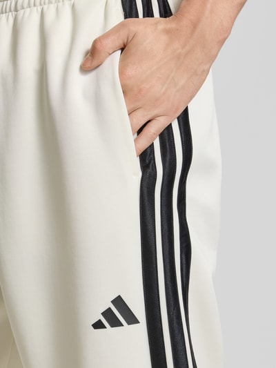 adidas Sportswear Relaxed fit sweatpants met logostitching, model 'Stadium' Offwhite - 3