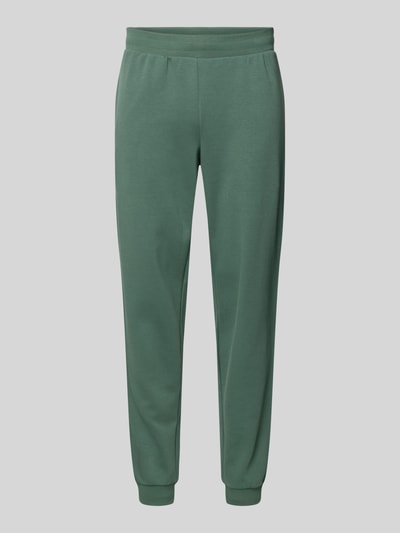 Produktfoto, grüne Sweatpants aus Baumwoll-Mix von EA7 Emporio Armani, lockere Passform, elastischer Bund mit Tunnelzug, elastische Beinabschlüsse, Eingrifftaschen, glatte Textur