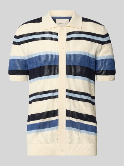 Produktfoto, Slim Fit Poloshirt in Strick-Optik van Gant, puur katoen, polokraag, met korte mouwen, knoopsluiting, elastische boorden, ruglengte maat M 71 cm, blauw, crème en zwart met streeppatroon, tricotlook