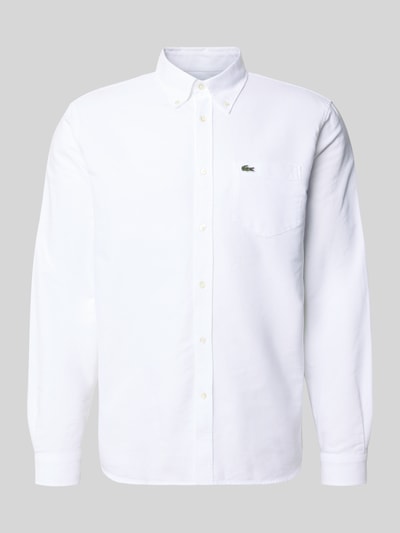 Produktfoto, Regular Fit Freizeithemd aus reiner Baumwolle von Lacoste, gładki biały kolor, bawełniany oxford, kołnierzyk button-down, logo na piersi