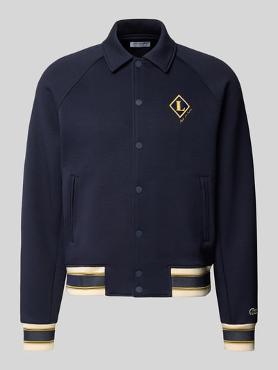 Produktfoto, granatowa bluza rozpinana Regular Fit Sweatjacke aus Baumwoll-Mix von Lacoste, gładka struktura, żółte detale, Herren Sweatjacke