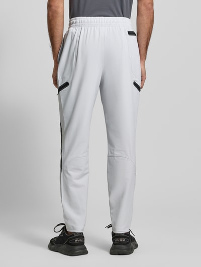 Under Armour Regular Fit Sweatpants mit Logo-Print Modell 'Unstoppable' Hellgrau 5