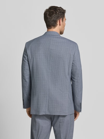 Männermodel trägt Regular Fit Anzugsakko aus Woll-Mix Modell 'DUKE' von SELECTED HOMME in Melange-Optik, Ganzkörperansicht Rückansicht.
