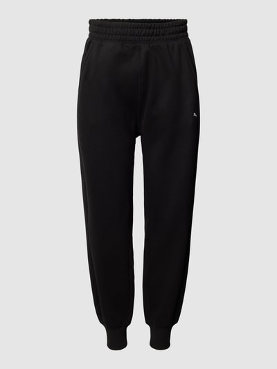 PUMA PERFORMANCE Spodnie dresowe w jednolitym kolorze z elastycznym pasem Czarny 2