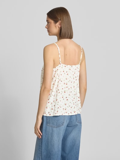 Frauenmodel trägt Regular Fit Blusentop aus reiner Viskose Modell 'NALA LIFE' von Only mit Allover-Muster, Rückansicht Ganzkörperansicht.