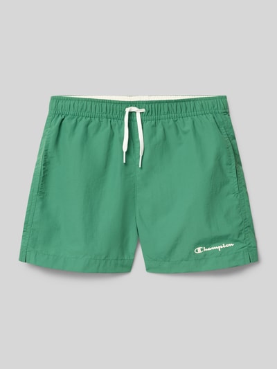 Produktfoto, groene zwembroek met elastische band en trekkoord, zij-steekzakken, logoprint, Badehose mit Eingrifftaschen und Logo-Print van CHAMPION, loose fit, kinderen