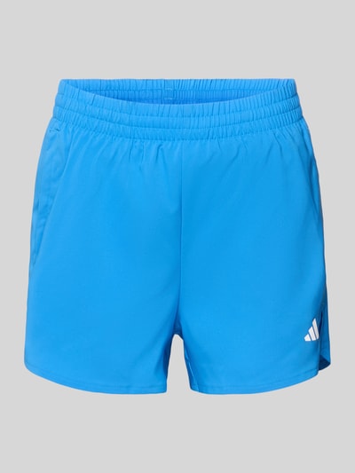 Produktfoto, Regular Fit Sport-Shorts mit elastischem Bund von adidas Sportswear, Optik: Unifarben, Passform: Regular-Fit, Logo-Print, Bundabschluss: elastisch mit Tunnelzug, Eingrifftasche, glänzende glatte Textur, leuchtendes Blau