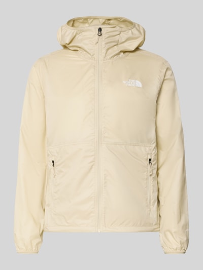 Productfoto, Windbreaker met logo en ritszakken van The North Face, regular fit, met capuchon, lichte crèmekleur, gladde textuur