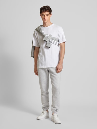 adidas Originals Tapered fit sweatpants met labelstitching Lichtgrijs gemêleerd - 1