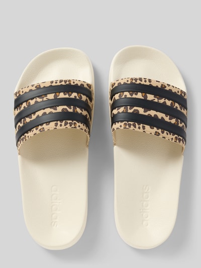 Produktfoto, Badeschuhe mit Animal Print Modell 'ADILETTE SHOWER' von adidas Sportswear, Optik: Unifarben, Schuhspitze: Rund, Absatzform: Flach, Muster: Animal-Print, Applikation: Label-Prägung, strukturierte Sohle