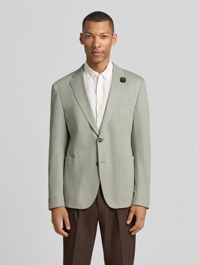Männermodel trägt Sakko mit floraler Applikation Modell 'Hoverest' von JOOP! Collection, Viskose-Mix, Regular-Fit, Ganzkörperansicht von vorne.