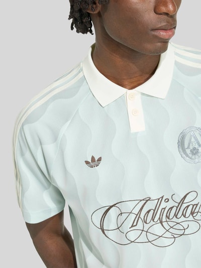 adidas Originals Relaxed Fit Poloshirt mit Logo-Applikation Schilf 6