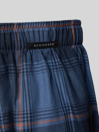 Produktfoto, Boxershorts aus reiner Baumwolle im 2er-Pack von SCHIESSER mit blau-orange kariertem Muster, elastischem Bund und Label-Detail.