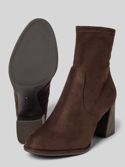 Productfoto, Stiefeletten mit Blockabsatz in Schlangenleder-Optik van Tamaris in effen bruin met ronde neus, blokhak, ritssluiting en suède look.