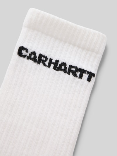 Produktfoto, Socken mit Label-Detail von Carhartt Work In Progress, weißer Baumwoll-Mix mit Stretch-Anteil und elastischem Rippenbündchen, körpernahe Passform