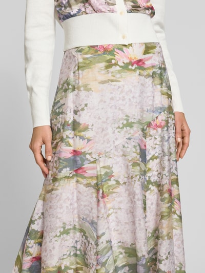 Kobiece modelka nosi Midirock mit Reißverschluss Modell 'LAYDA' von Ted Baker, lyocellowy miks, wzór kwiatowy, A-linia, z bocznym zamkiem, Szerokość w rozmiarze 36: 37 cm, długość całkowita: 82 cm, zbliżenie na górną część spódnicy