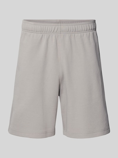Produktfoto, Shorts mit elastischem Bund und Label-Stitching von CHAMPION aus Baumwoll-Mix in Grau, Regular Fit, glatte Textur.