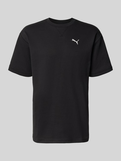 PUMA Performance t-shirt o kroju relaxed fit z czystej bawełny model 'ESS ELEVATED' Czarny 1