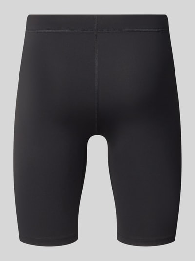 Produktfoto, Slim Fit Radlerhose mit Logo-Print Modell 'Core' von ASICS TIGER, czarny kolor, elastyczna mieszanka materiałów, krój slim fit, nadruk z logo, Szerokość w rozmiarze M: 33 cm, Długość wewnętrzna nogawki: 21 cm.