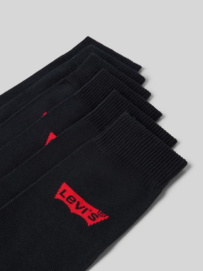 Produktfoto, schwarze Socken aus Baumwoll-Mix im 6er-Pack von Levi's®, rote Logo-Details, weiche Textur, Herren Socken von Levi's®