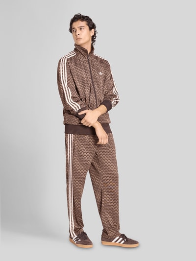 adidas Originals Loose fit trainingsjack Model 'FIREBIRD LOOSE MONOGRAM' Donkerbruin - 1