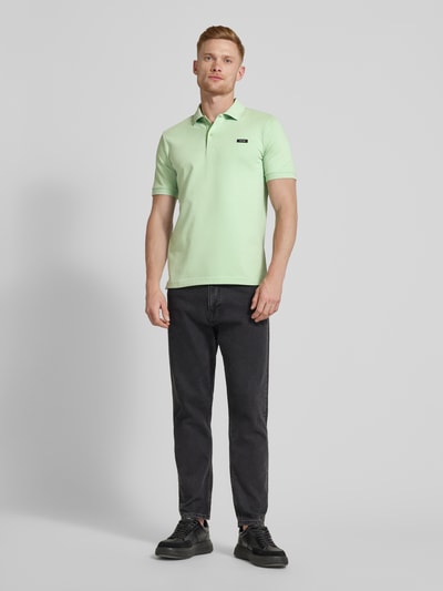 CK Calvin Klein Slim Fit Poloshirt in unifarbenem Design Hellgruen 1