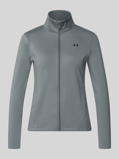 Productfoto, trainingsjack met opstaande kraag en logo van Under Armour, materiaalmix met stretch, slim fit, ritssluiting, steekzakken, dames, kleur grijs