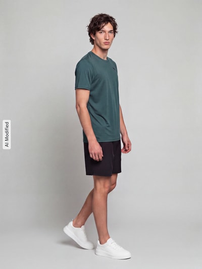 PUMA Performance Regular Fit sport-t-shirt met logoprint Donkergroen - 1