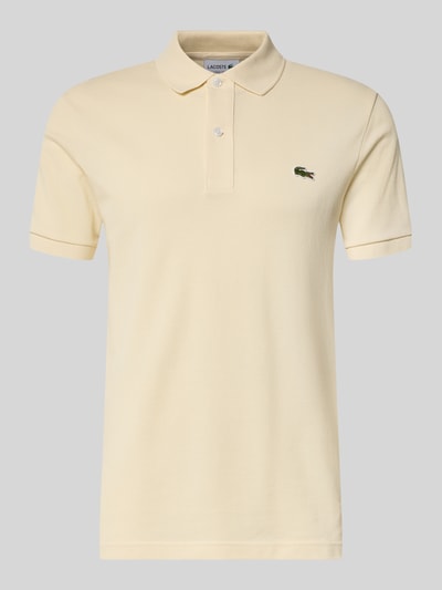 Produktfoto, jasnożółta koszulka polo Slim Fit Poloshirt aus reiner Baumwolle von Lacoste, jednolita, lekko fakturowana bawełna