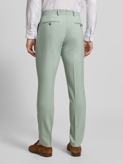 Männermodel trägt Slim Fit Anzughose mit Woll-Anteil Modell 'SLIM-NEIL' von SELECTED HOMME, Optik: Unifarben, Passform: Slim Fit, Gürtelschlaufen, Bügelfalten, Verschluss: Schiebehaken, Knopf und verdeckter Reißverschluss, seitliche Eingrifftaschen, Gesäßtaschen, hellgrüne Farbe, glatte Textur, Ganzkörperansicht Rückansicht.
