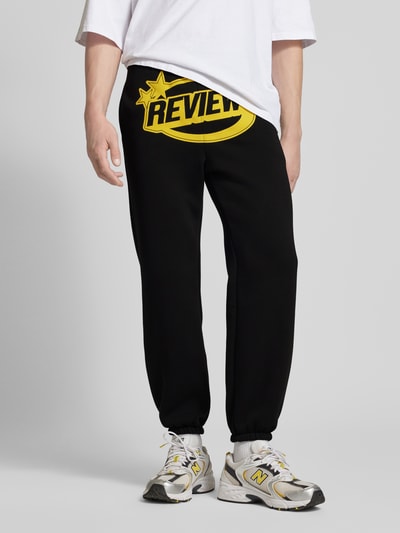 REVIEW Regular fit sweatpants met labelprint Zwart - 4