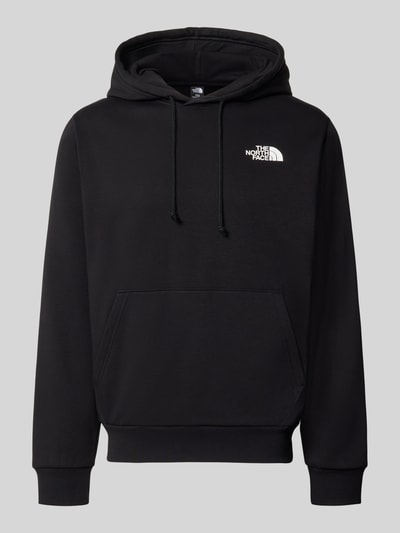 Produktfoto, schwarzer Regular Fit Hoodie mit Kapuze Modell "EVOLUTION BOX" von The North Face, Baumwoll-Mix, sichtbare Känguru-Tasche, elastische Abschlüsse