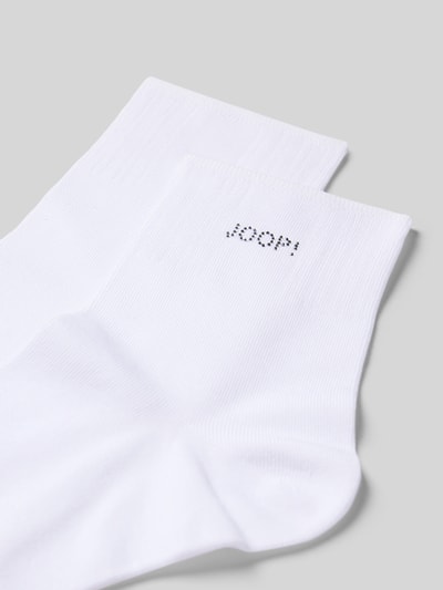 Produktfoto, weiße Socken mit Strasssteinbesatz von JOOP!, Baumwoll-Mix mit Modal-Anteil, Logo-Detail und elastischer Bund.