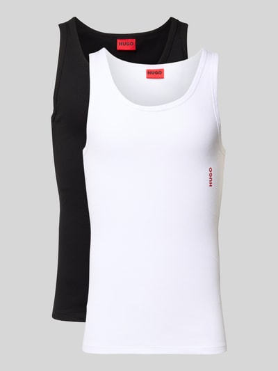 Produktfoto, Tanktop mit Label-Print im 2er-Pack von HUGO aus Baumwoll-Elasthan-Mix, körpernahe Passform, Rundhalsausschnitt, breite Träger, Ripp-Optik, schwarz und weiß