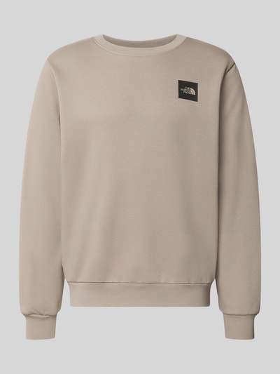 Produktfoto, Regular Fit Sweatshirt mit Logo-Detail von The North Face in Beige, Baumwoll-Mix mit elastischen Abschlüssen, Rundhalsausschnitt.