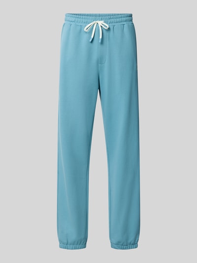 Produktfoto, Sweatpants mit elastischem Bund und Tunnelzug von Scotch & Soda in Blau, reine Baumwolle, Regular Fit, Logo sichtbar.