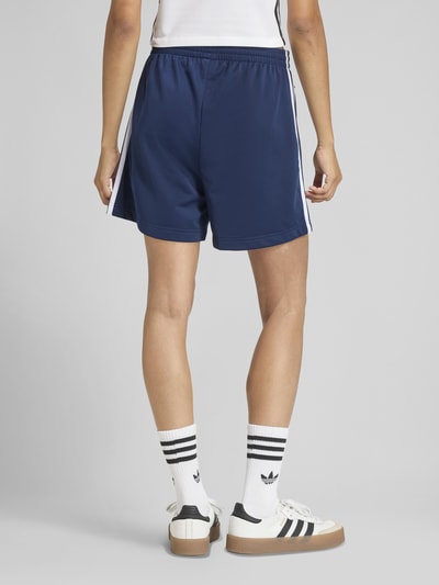 adidas Originals Loose fit sweatbroek met contraststrepen Donkerblauw - 4