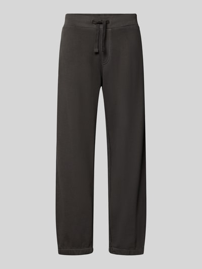 Produktfoto, schwarze Relaxed Fit Sweathose aus reiner Baumwolle von G-Star RAW vor grauem Hintergrund, glatte Textur