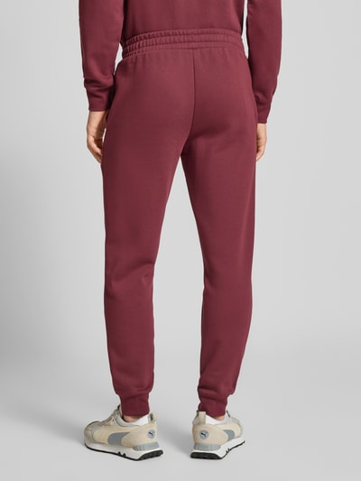 PUMA PERFORMANCE Sweatpants mit Label-Stitching und elastischem Bund Bordeaux 5