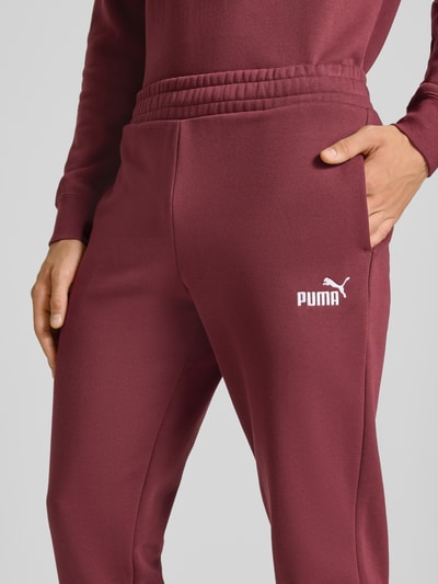 PUMA PERFORMANCE Sweatpants mit Label-Stitching und elastischem Bund Bordeaux 3