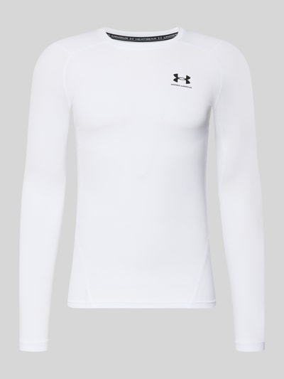 Productfoto, wit Slim Fit Longsleeve met logo-print van Under Armour, elastische materiaalmix, ronde hals, ruglengte maat M 64 cm.