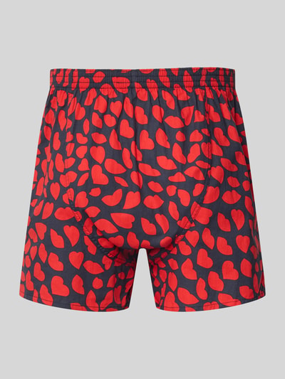 Produktfoto, Boxershorts aus reiner Baumwolle mit Label-Detail von Deal, locker geschnitten, rotes Herzmuster auf dunkelblau, elastischer Bund