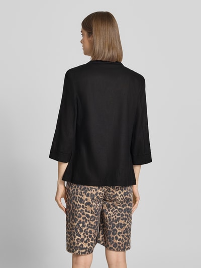 Frauenmodel trägt Relaxed Fit Blazer aus Viskose-Leinen-Mix Modell 'GOA' von Only, Optik: Unifarben, 3/4-Arm, Leistentaschen, Ganzkörperansicht Rückansicht.
