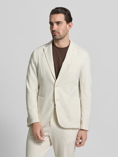 Mannelijk model draagt Slim Fit Sakko met Viskose-Anteil Modell 'P-HANRY-J-WG-PK-261F' van BOSS in effen beige met reverskraag, borstzak en opgestikte zakken, stretchmateriaal, voorkant volledige lichaamsweergave