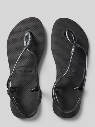 Produktfoto, schwarze Damen Sandalen mit Logo-Detail von Havaianas, abgerundete Passform, offene Ferse, Zehentrenner, Absatzhöhe 1 cm, strukturierte Oberfläche
