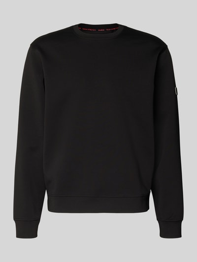 Produktfoto, schwarzes Sweatshirt mit Rundhalsausschnitt von Guess, Material-Mix mit Viskose-Anteil, Label-Patch, Regular-Fit.