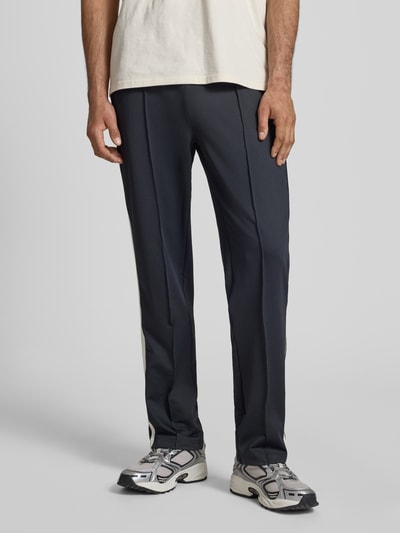 ellesse Spodnie dresowe o kroju straight fit z detalem z logo model 'Latucci' Czarny 4