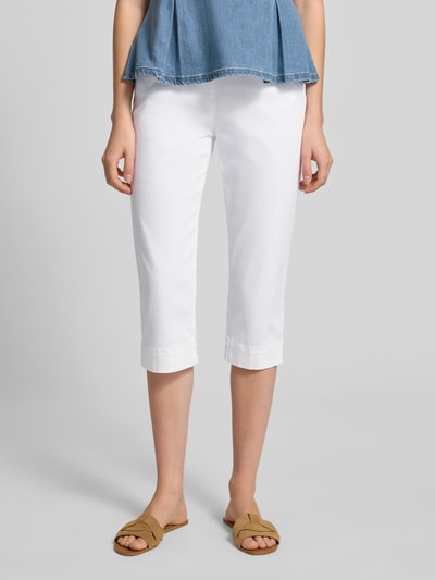 Kobiece model nosi Slim Fit Caprihose aus Baumwoll-Mix von Raphaela By Brax, efekt: jednolity kolor, krój slim fit, ściągacz: elastyczny, mieszanka bawełny, Ganzkörperansicht von vorne.