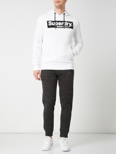 Superdry Spodnie dresowe z detalami z logo  Czarny 1