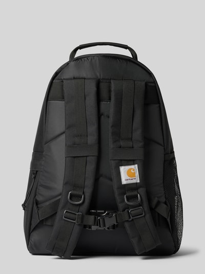 Productfoto, zwarte rugzakfunctie van Carhartt Work In Progress, Model 'KICKFLIP', logopatch, verstelbare schouderbandjes, hoofvak met ritssluiting, ritszak, Afmetingen maat 1: Breedte 44 cm, Lengte 47 cm, Diepte 16 cm, bandlengte schouderband 66 cm